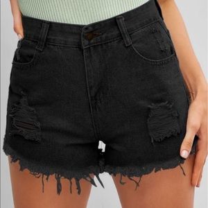 Black frayed hem ripped denim cut off shorts